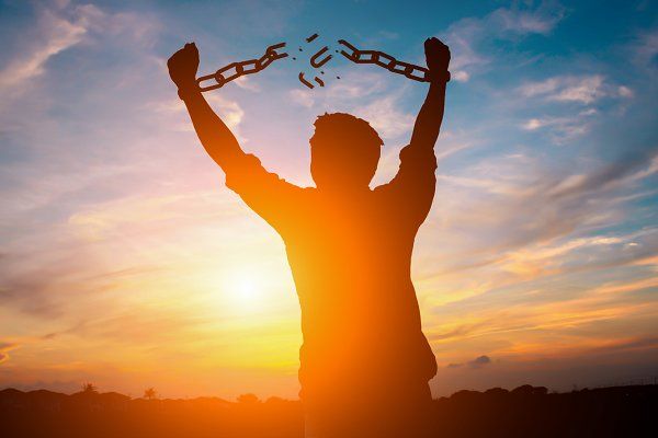 Person breaking free from chains meme